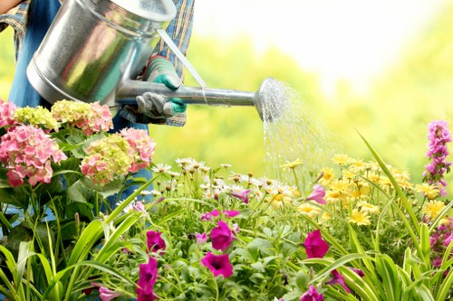 Sustainable landscaping practices with recycling and planting in Stratford